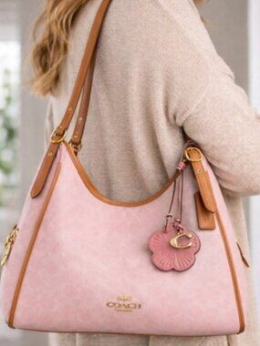 The brand new Coach Erin shoulder bag, made of classic canvas.